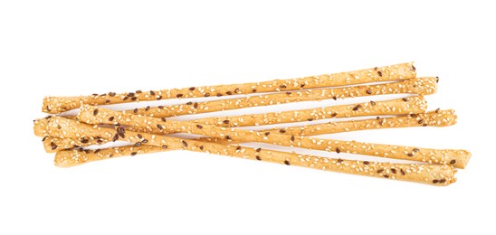 Fresh delicious grissini sticks on white background, top view