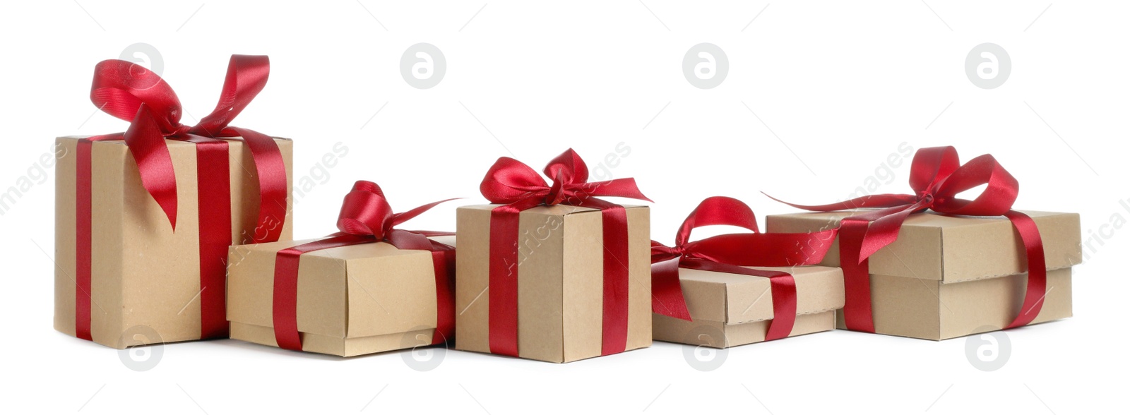 Photo of Christmas present. Many kraft gift boxes on white background