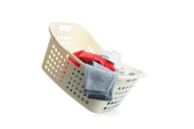 Laundry basket with clothes isolated on white