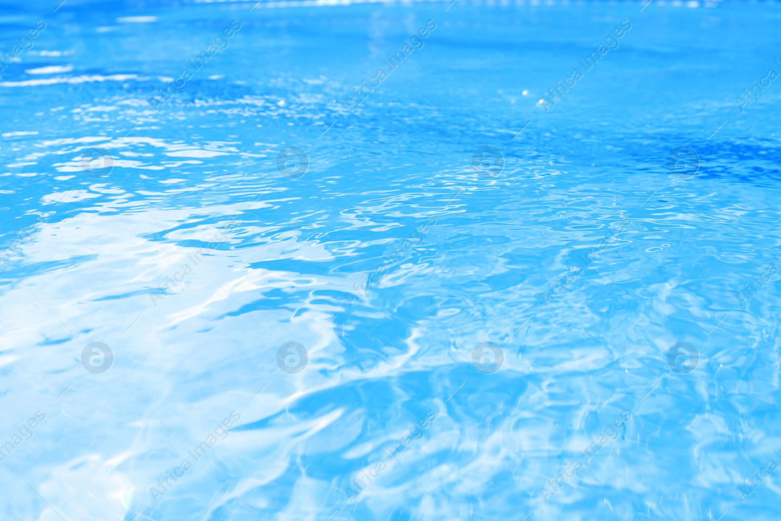 Photo of Outdoor swimming pool with clear rippled water