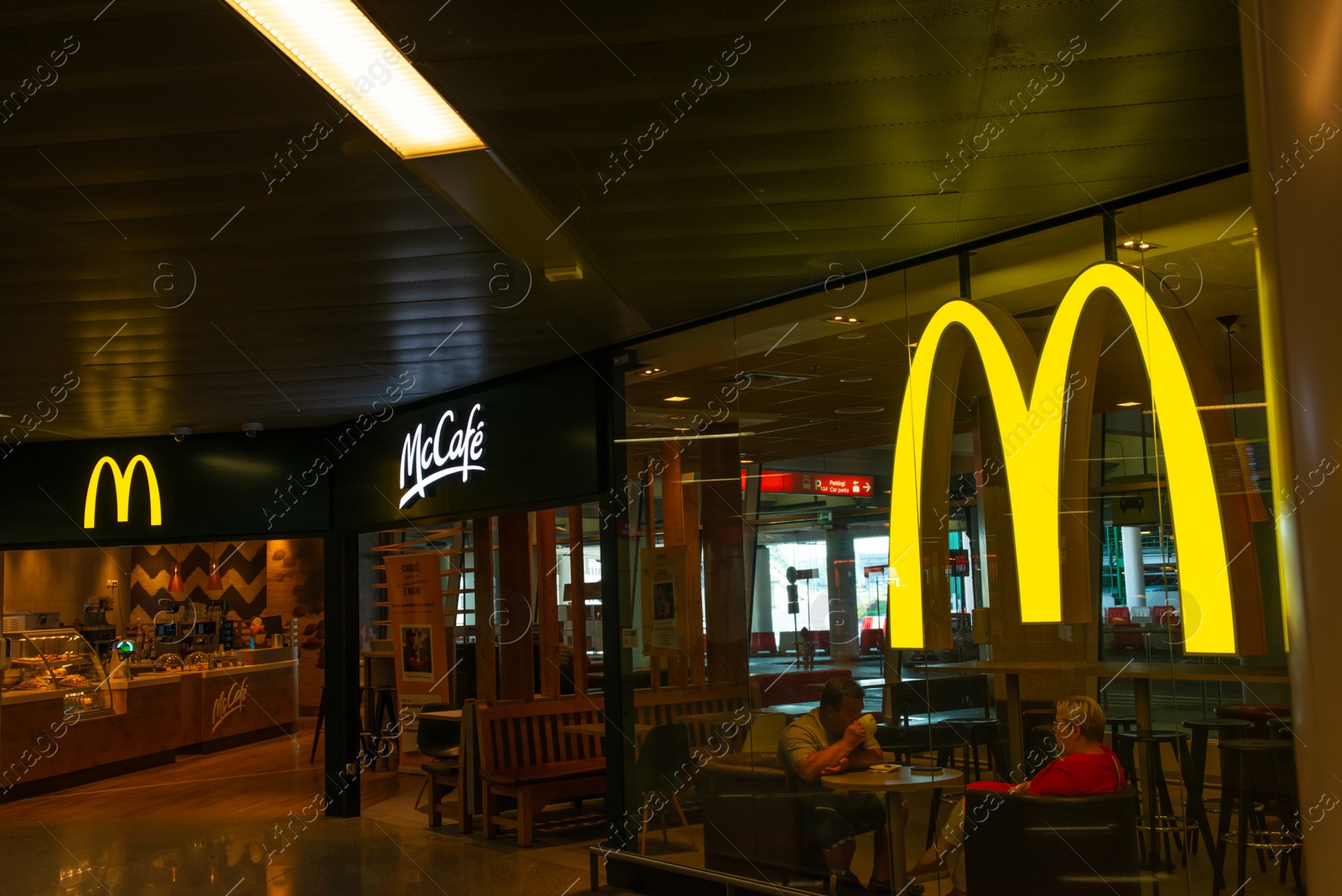 Photo of WARSAW, POLAND - AUGUST 05, 2022: View of McDonald's Restaurant entrance inside bus station