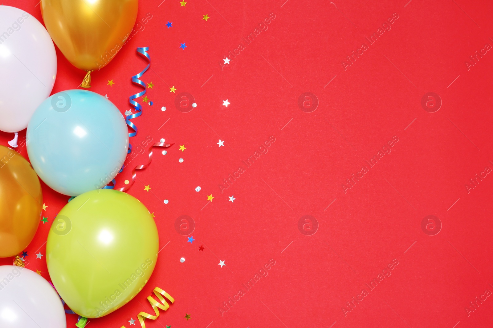 Photo of Flat lay composition with balloons and space for text on color background