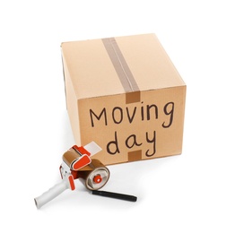 Photo of Moving box, marker and adhesive tape dispenser on white background