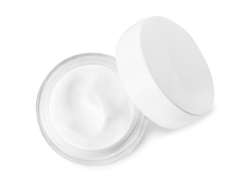 Photo of Jar of organic cream and cap isolated on white, top view