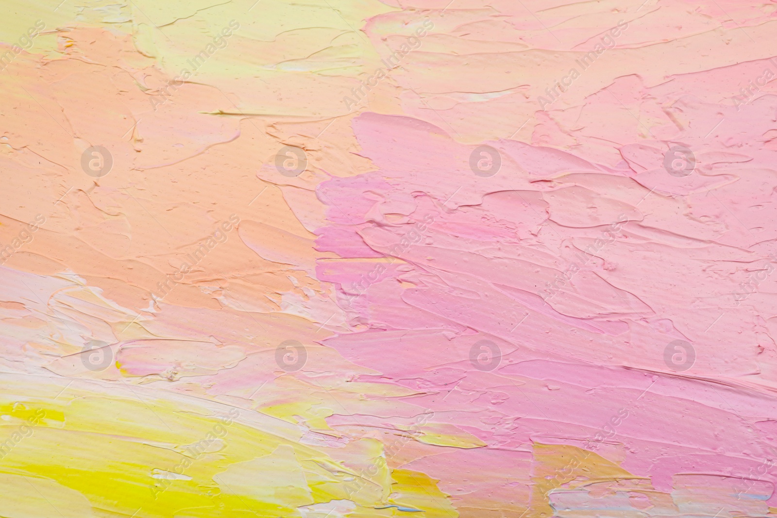 Photo of Beautiful strokes of pastel oil paints as background, closeup