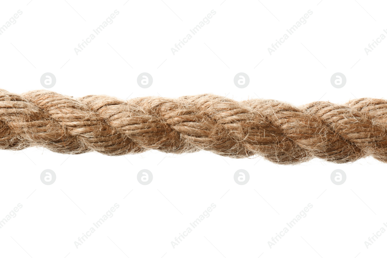 Photo of Hemp rope on white background, closeup. Organic material