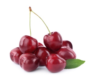 Photo of Tasty ripe red cherries with green leaf isolated on white