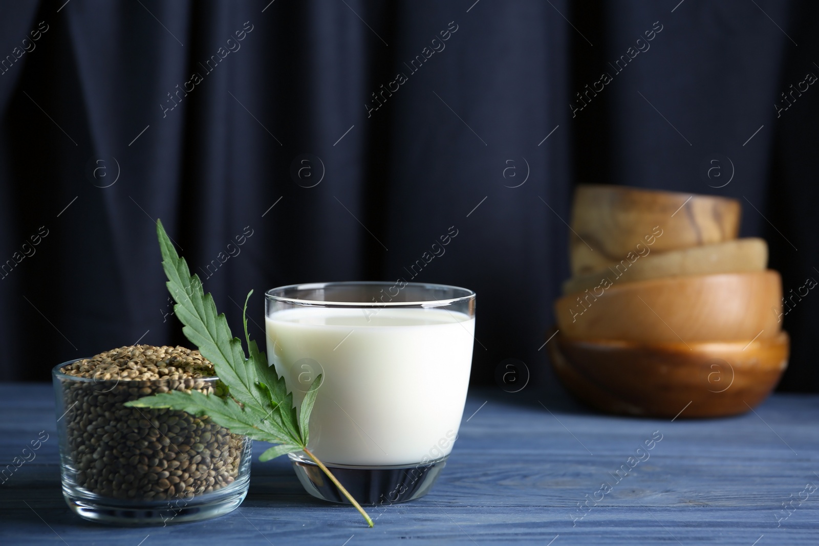 Photo of Composition with hemp milk and seeds on table