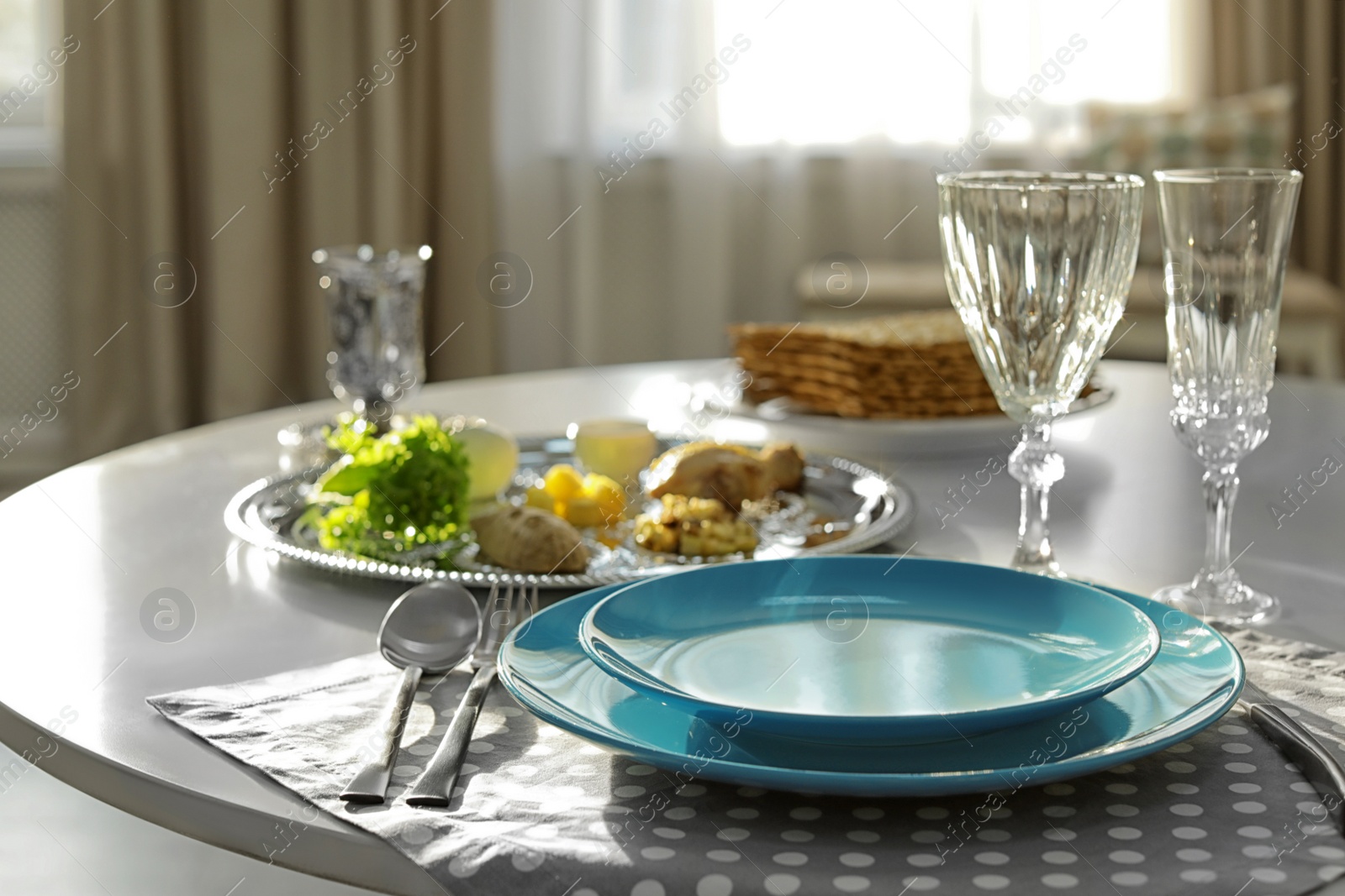 Photo of Table served for Passover (Pesach) Seder indoors, space for text