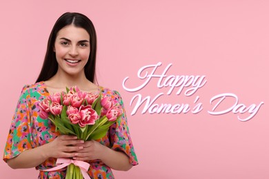 Happy Women's Day - March 8. Attractive lady with bouquet of tulips on pink background