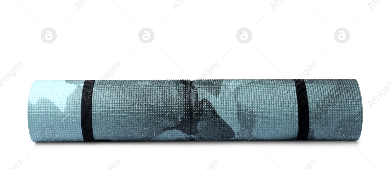 Photo of Rolled mat isolated on white. Camping tourism equipment