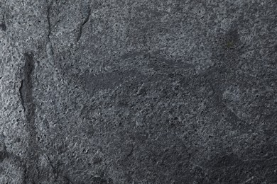 Image of Texture of dark grey stone surface as background, closeup