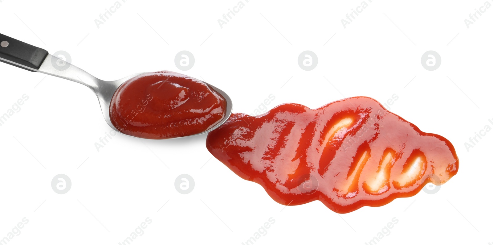 Photo of Tasty ketchup with spoon isolated on white. Tomato sauce