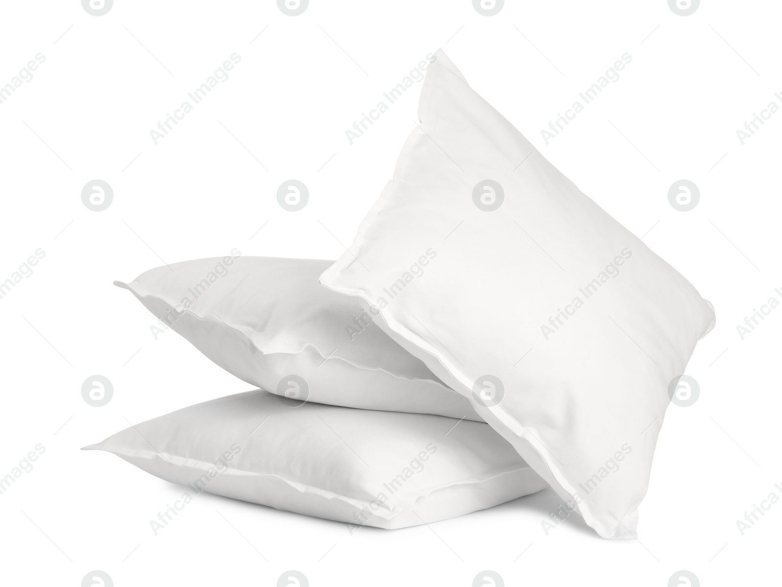 Photo of Many new soft pillows isolated on white