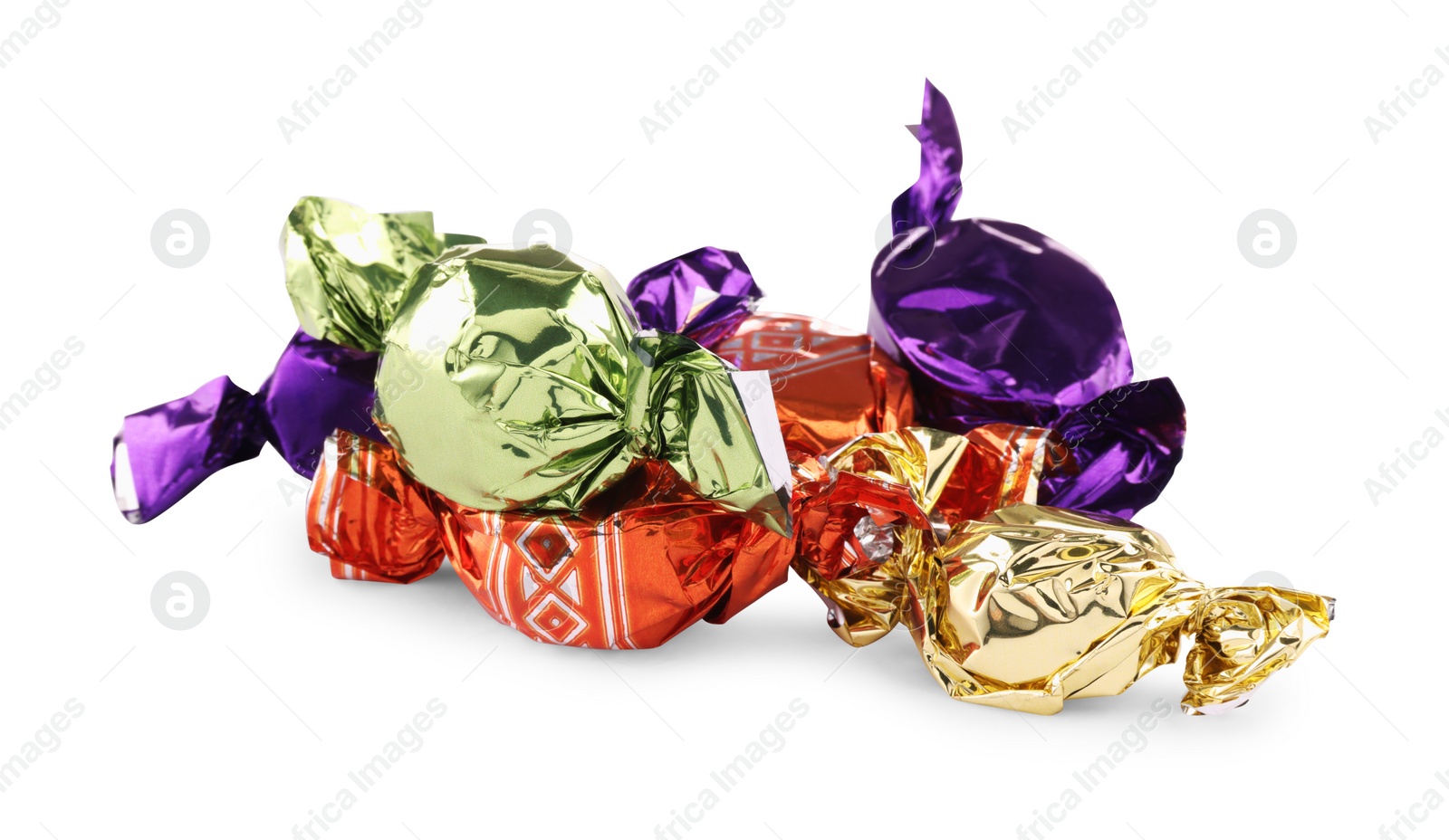 Photo of Candies in colorful wrappers isolated on white