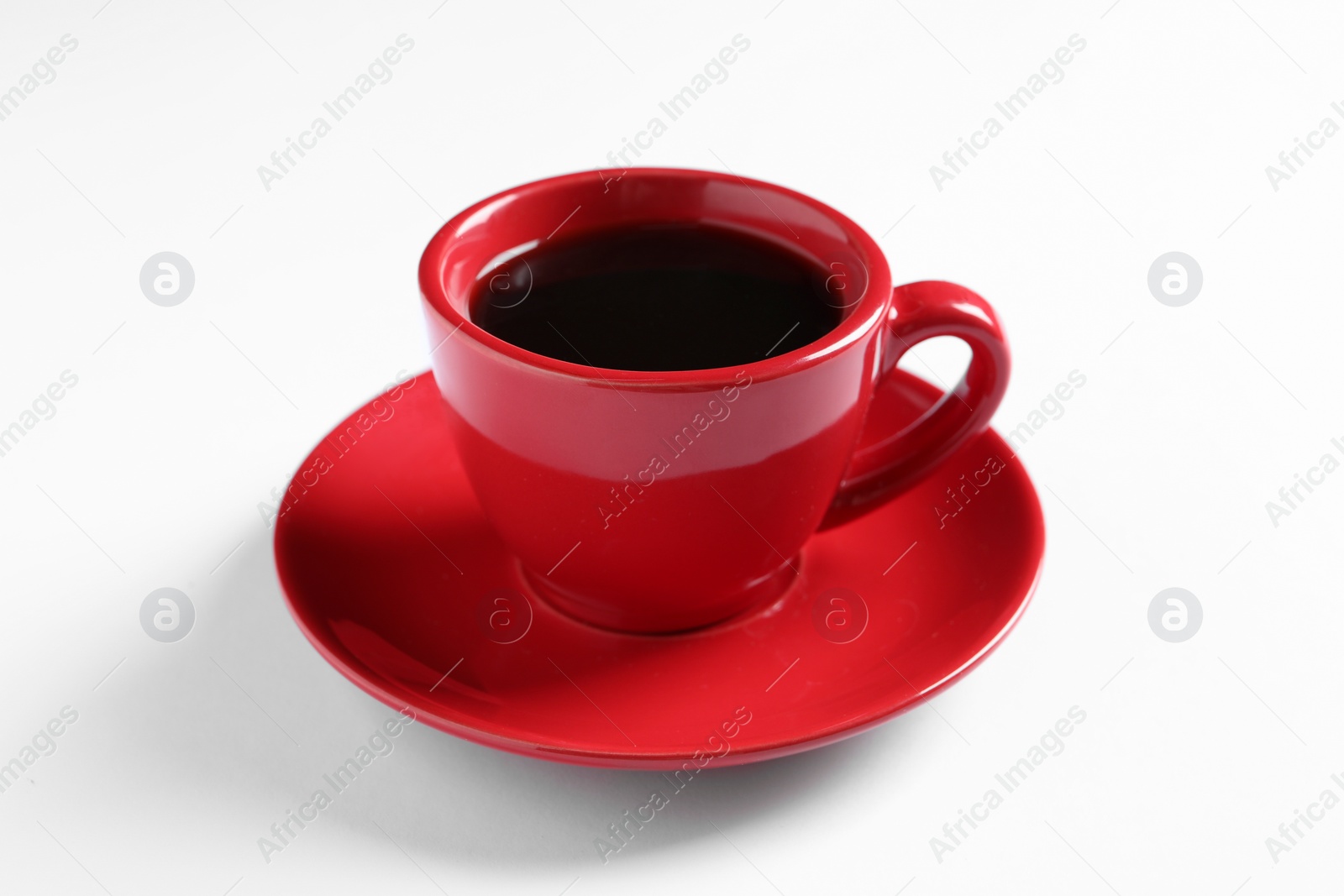 Photo of Red cup with aromatic coffee on white background