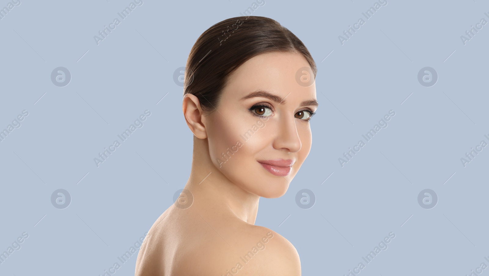 Image of Young woman with beautiful face on light background. Banner design