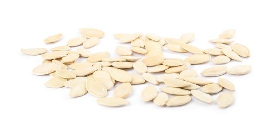 Photo of Raw unpeeled pumpkin seeds on white background