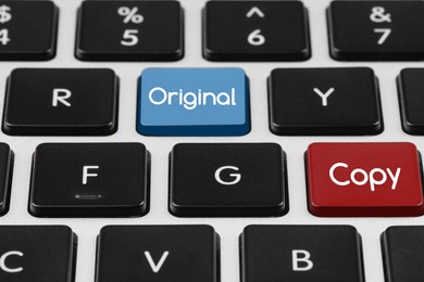 Image of Buttons with words Copy and Original on keyboard, closeup view. Plagiarism concept