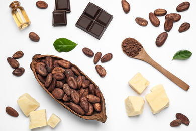 Photo of Composition with organic cocoa butter on white background, top view