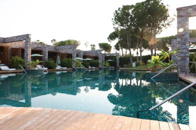 Photo of Outdoor swimming pool at resort, blurred view