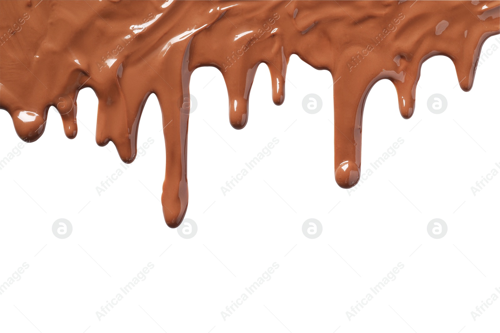 Photo of Tasty melted milk chocolate pouring down on white background