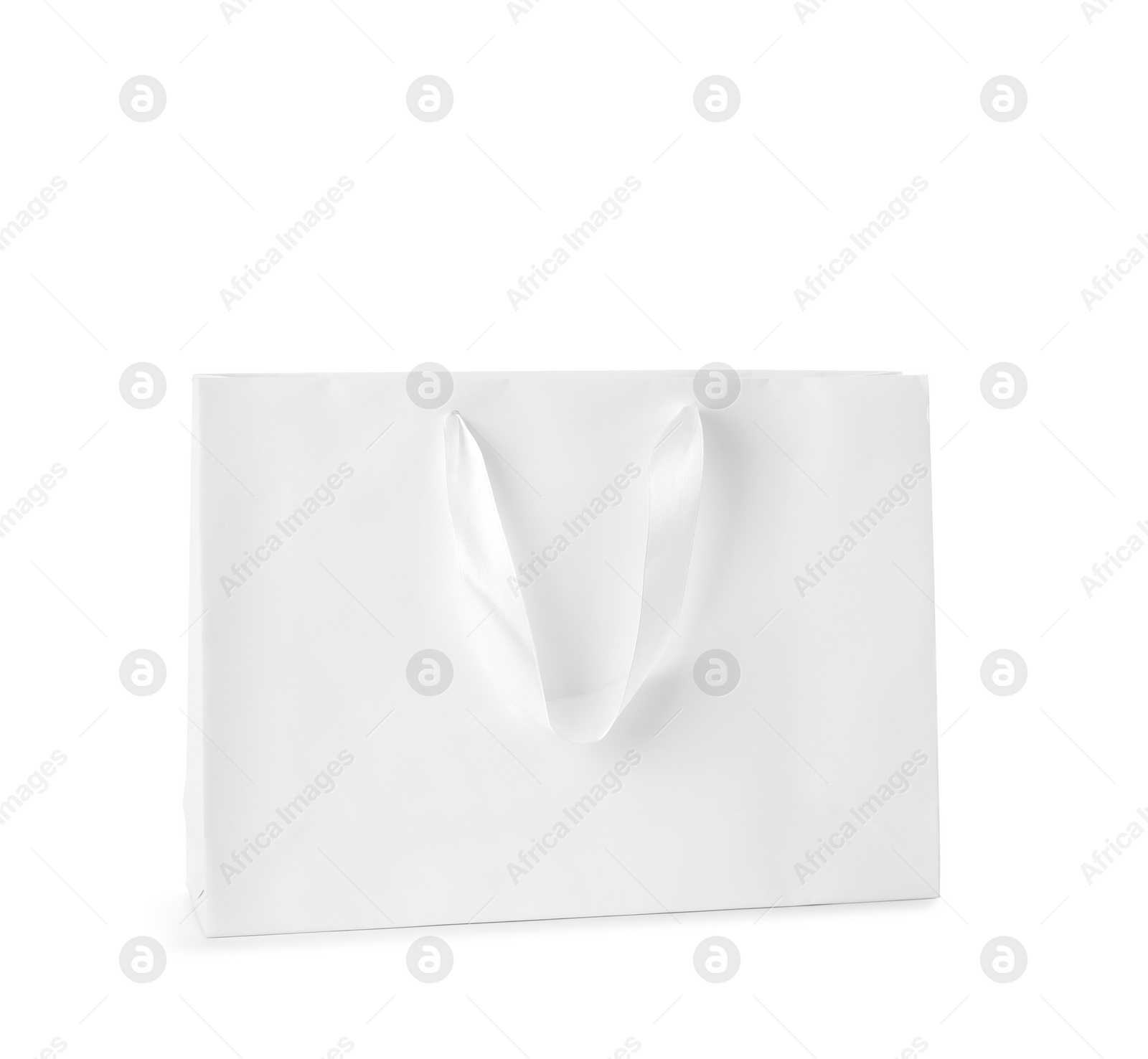 Photo of Paper shopping bag isolated on white. Mock up for design