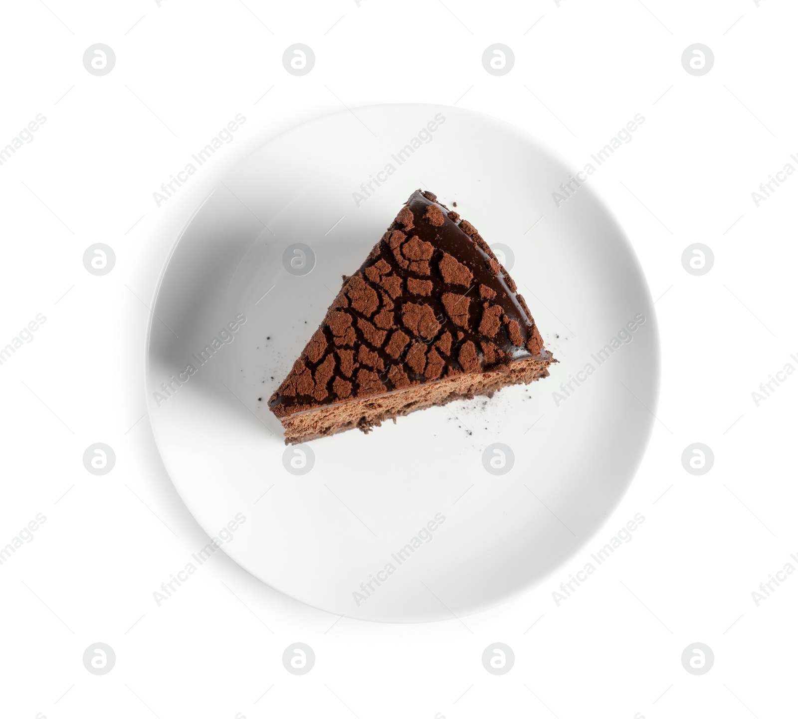 Photo of Piece of delicious chocolate truffle cake isolated on white, top view