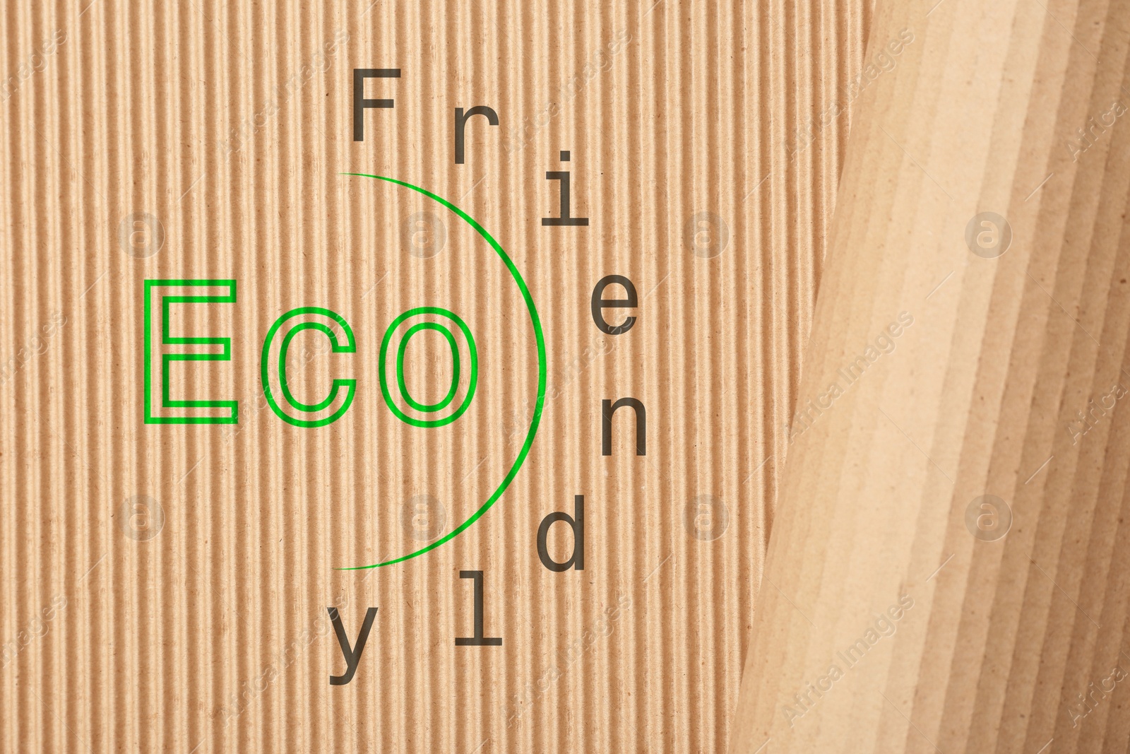 Image of Phrase Eco Friendly written on cardboard, top view