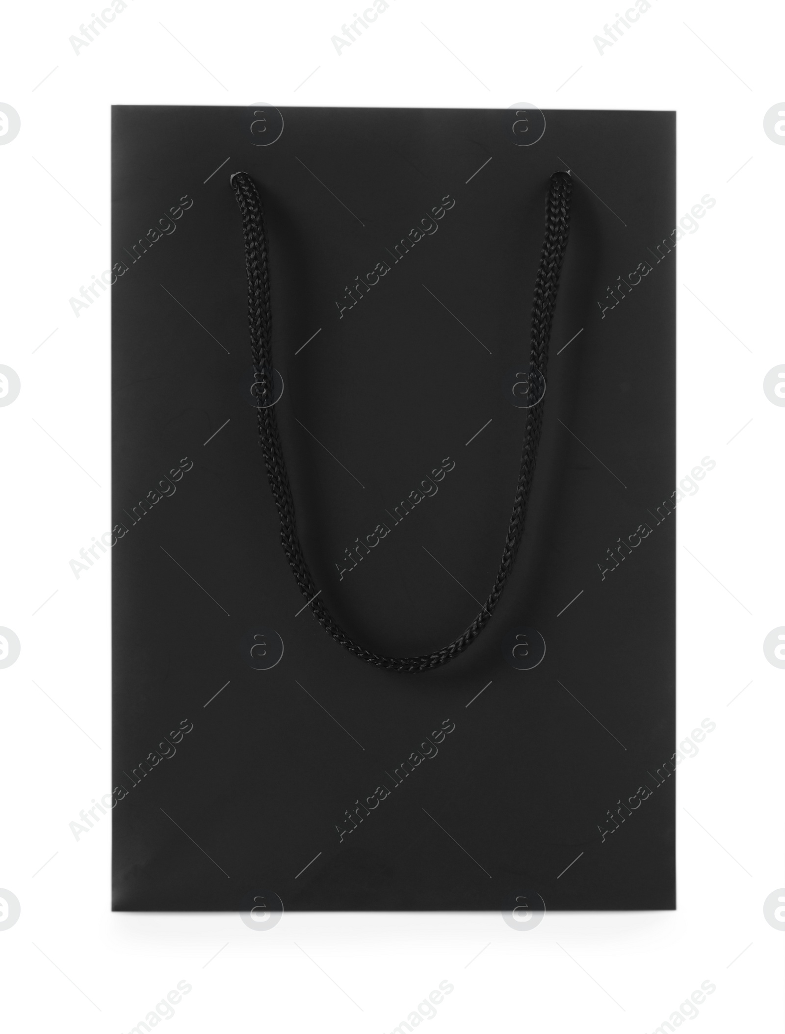 Photo of One black paper bag isolated on white