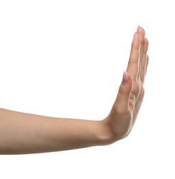 Woman showing stop gesture on white background, closeup