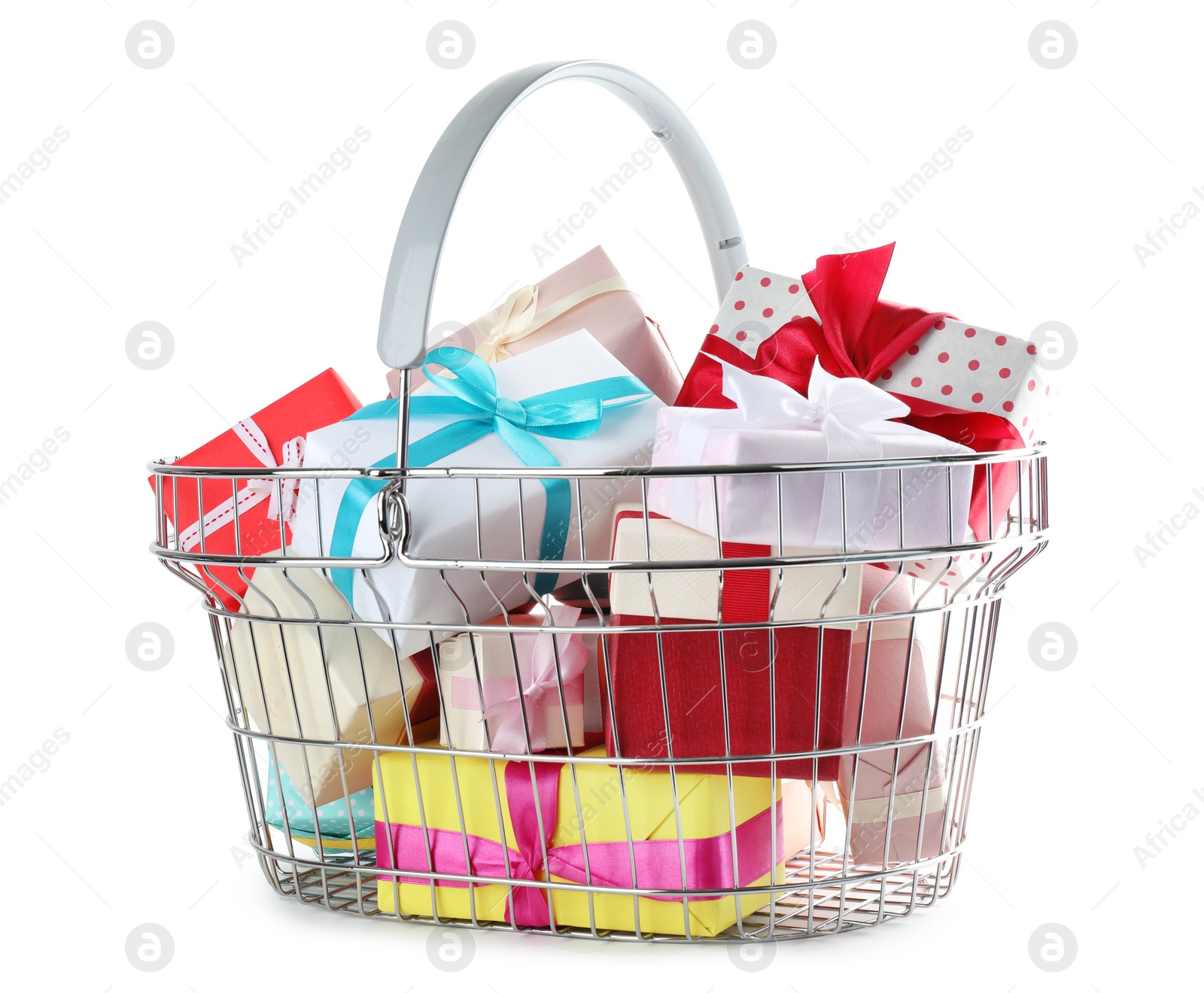 Photo of Shopping basket full of gift boxes on white background