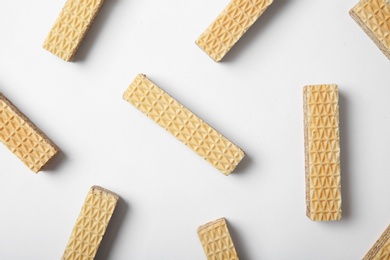 Photo of Flat lay composition with delicious crispy wafers on white background