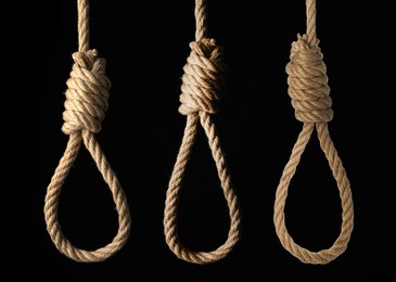 Image of Rope nooses with knots on black background, collage