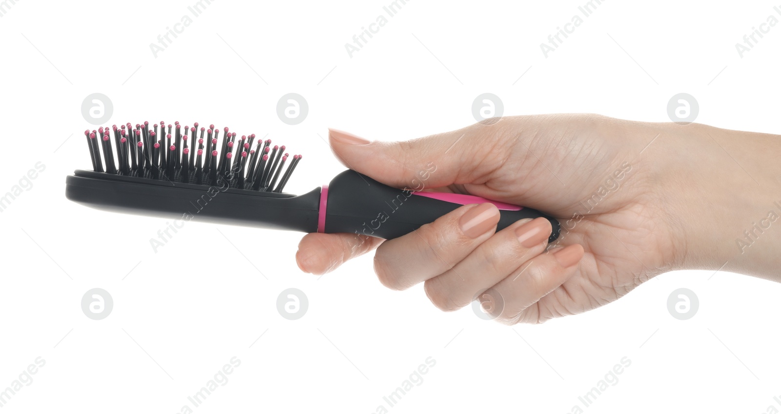 Photo of Woman holding modern hair brush on white background, closeup