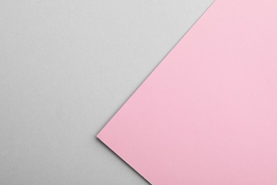 Colorful paper sheets as background, top view