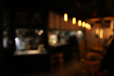 Photo of Blurred view of stylish modern cafe interior