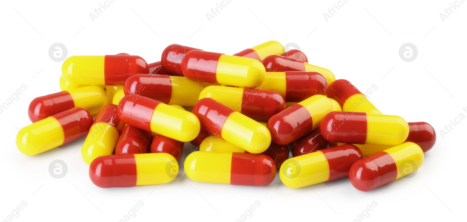 Photo of Many antibiotic pills isolated on white. Medicinal treatment