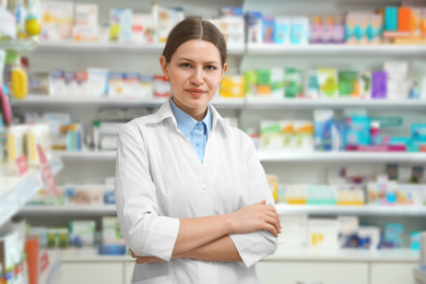 Portrait of professional pharmacist in modern drugstore