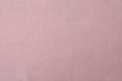 Texture of pink fabric as background, top view