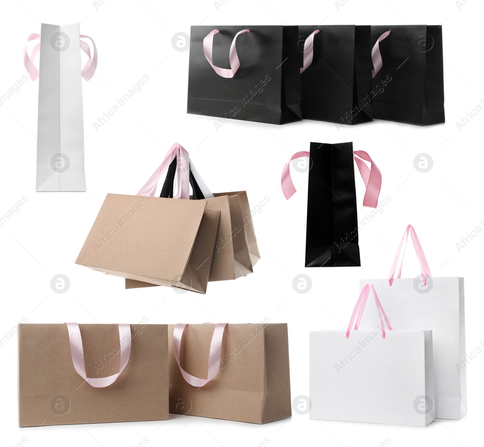 Image of Set with different paper shopping bags on white background