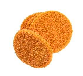 Delicious fried breaded cutlets on white background, top view