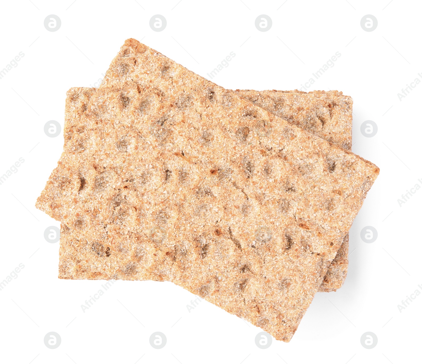 Photo of Fresh crunchy crispbreads on white background, top view