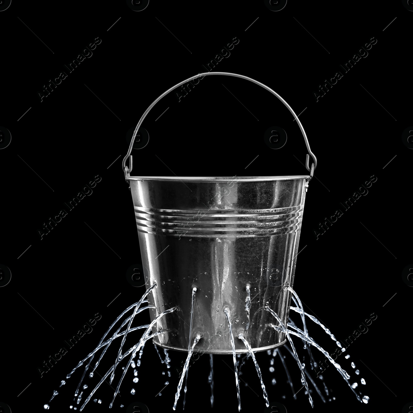 Image of Leaky bucket with water on black background 