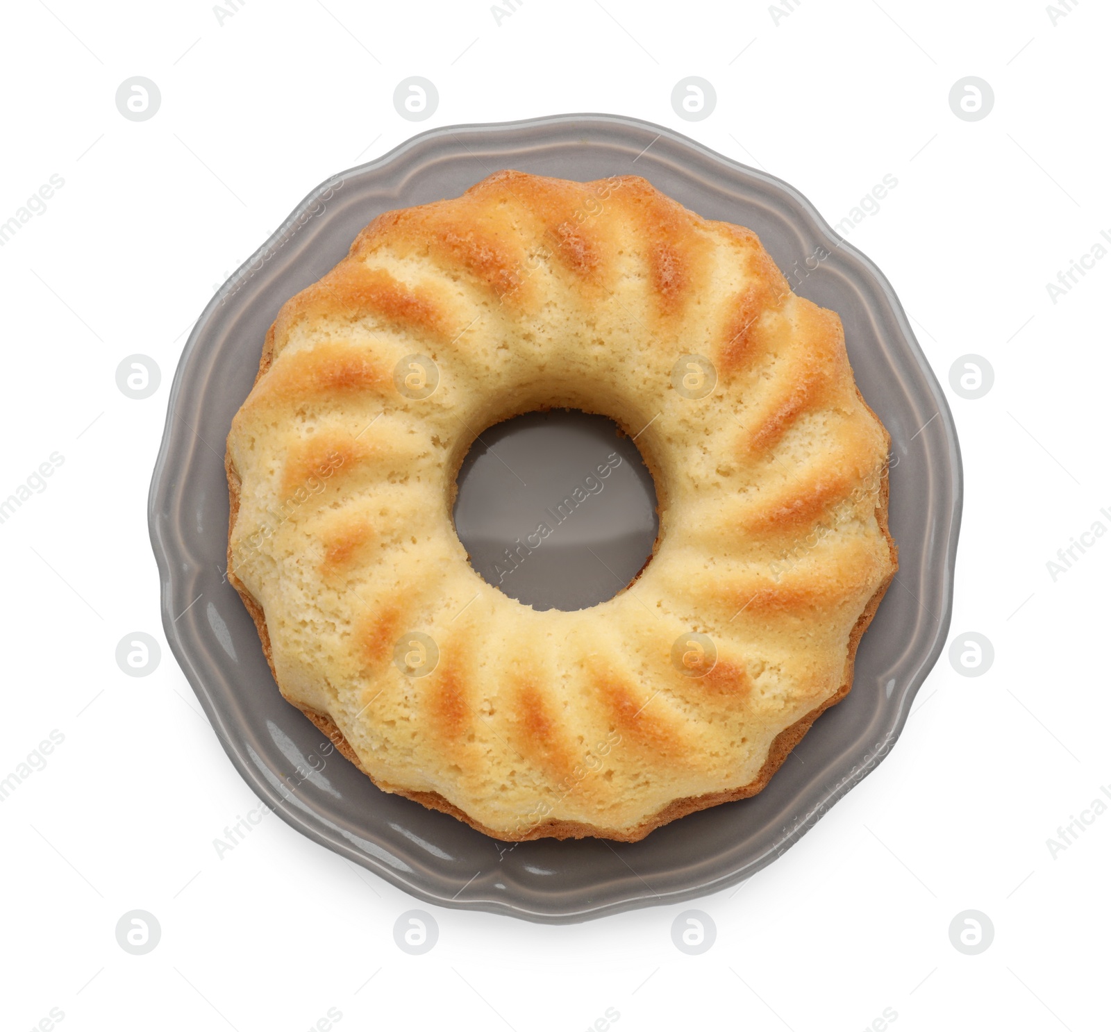 Photo of One tasty sponge cake isolated on white, top view