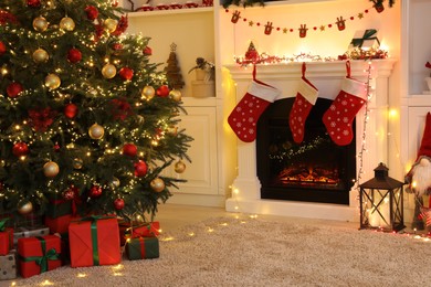 Living room interior with fireplace and festive decor. Christmas celebration