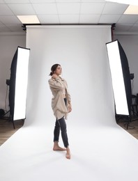 Photo of Portrait of beautiful woman on light grey background