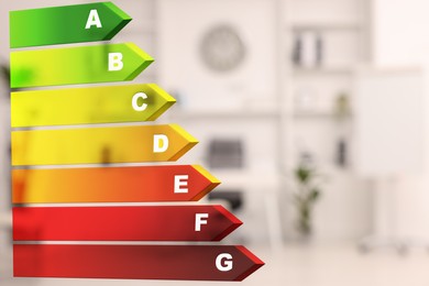 Image of Energy efficiency rating and blurred view of room interior