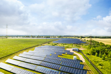 Image of Solar panels installed outdoors. Alternative energy source