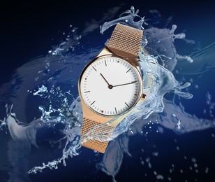 Luxury women's watch in water splashes demonstrating its waterproof